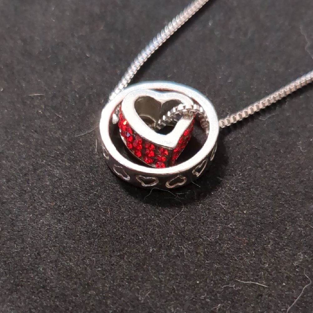 Elegant Silver and Red Heart Pendant Necklace